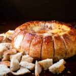 GARLIC PROSCIUTTO AND HOT HONEY BAKED BRIE BREAD BOWL